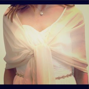 Chiffon shawl wrap with satin edges.